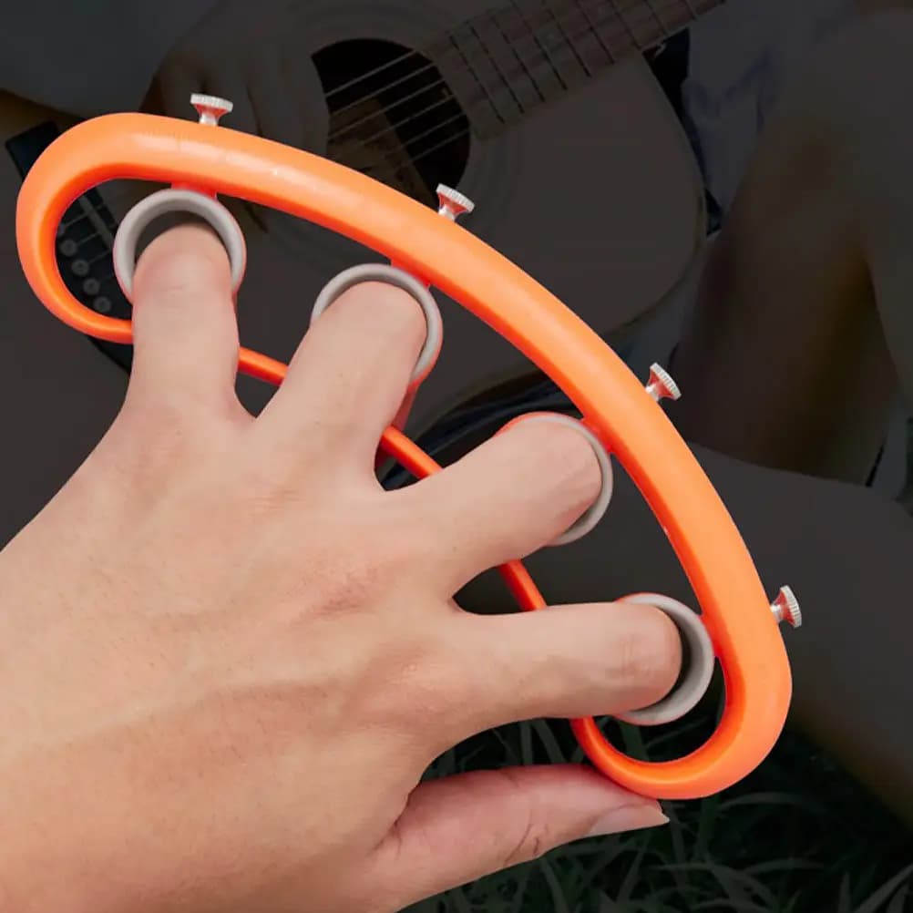 1 Pezzo Espansore per Dita, Strumento Musicale per Allenamento delle Dita, Attrezzo in Plastica per Pratica di Chitarra, Ukulele, Pianoforte, Arancione, Accessorio per Allenamento Chitarra