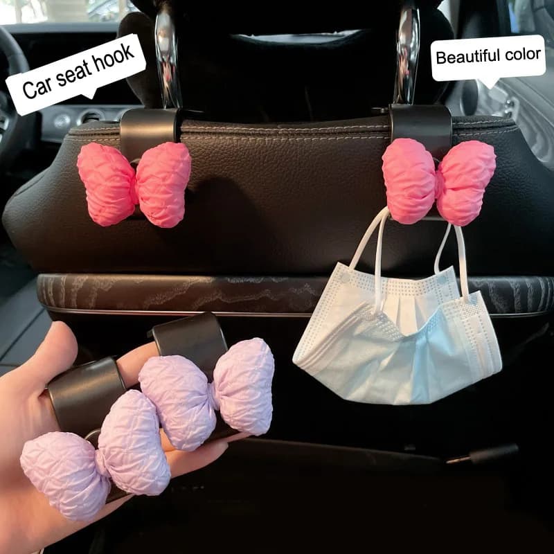 2 pezzi simpatico cartone animato fiocco rosa seggiolino auto ganci posteriori veicolo poggiatesta organizzatore gancio di stoccaggio per borsa della spesa borsa decorazione auto
