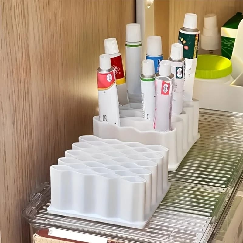 A storage shelf designed for home use to organize pipes, glue, makeup brushes and samples on a desktop, napkin holder with compartments