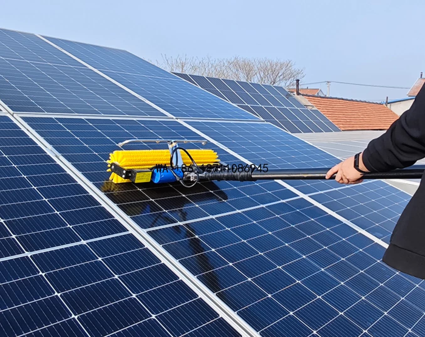 Automatic Robot for Cleaning Photovoltaic Solar Panels with Plastic Brush for Cleaning Solar Panels