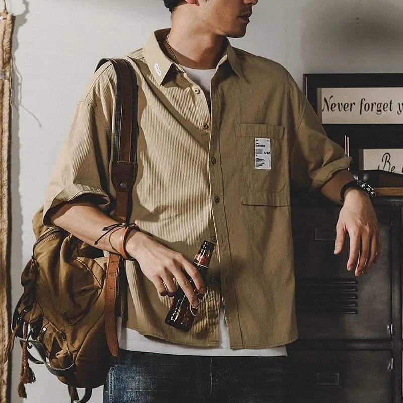 Camicia da lavoro casual americana da uomo a maniche corte estiva alla moda cardigan giapponese a mezza manica giacca ampia