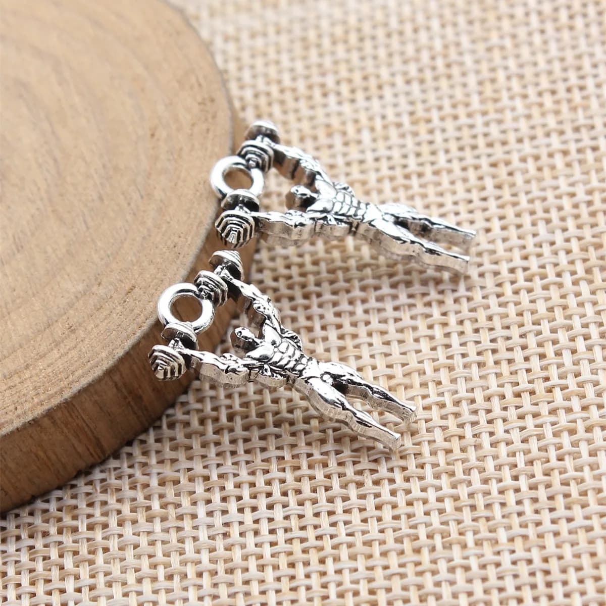 20pcs 25x14mm(0.98x0.55inch) Antique Silver Color Double-Sided Fitness Muscle Man Lifting Dumbbell Charms Pendants