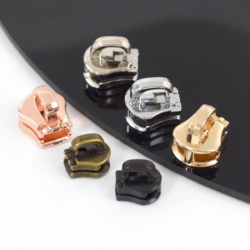 10-50 pezzi 3 # 5 # 8 # 10 # Cursori con cerniera per cerniere in metallo Chiusura con cerniera per borsa Tira con cerniera per bagagli Kit di riparazione per testa Accessori per cucito fai da te