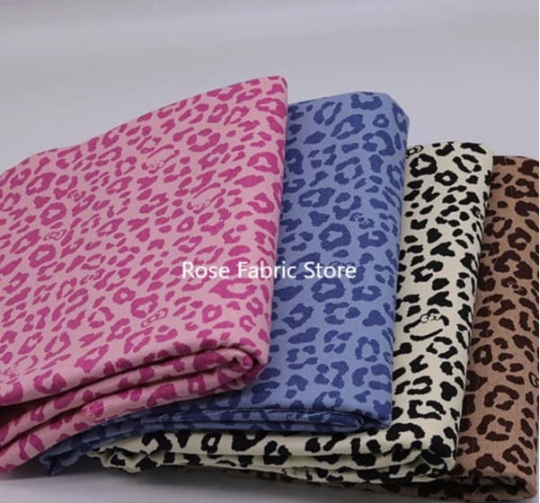 Classic jacquard washed denim fabric with 1 meter leopard print for jeans jackets, girl dresses, jeans, bags and do-it-your sewing fabric.
