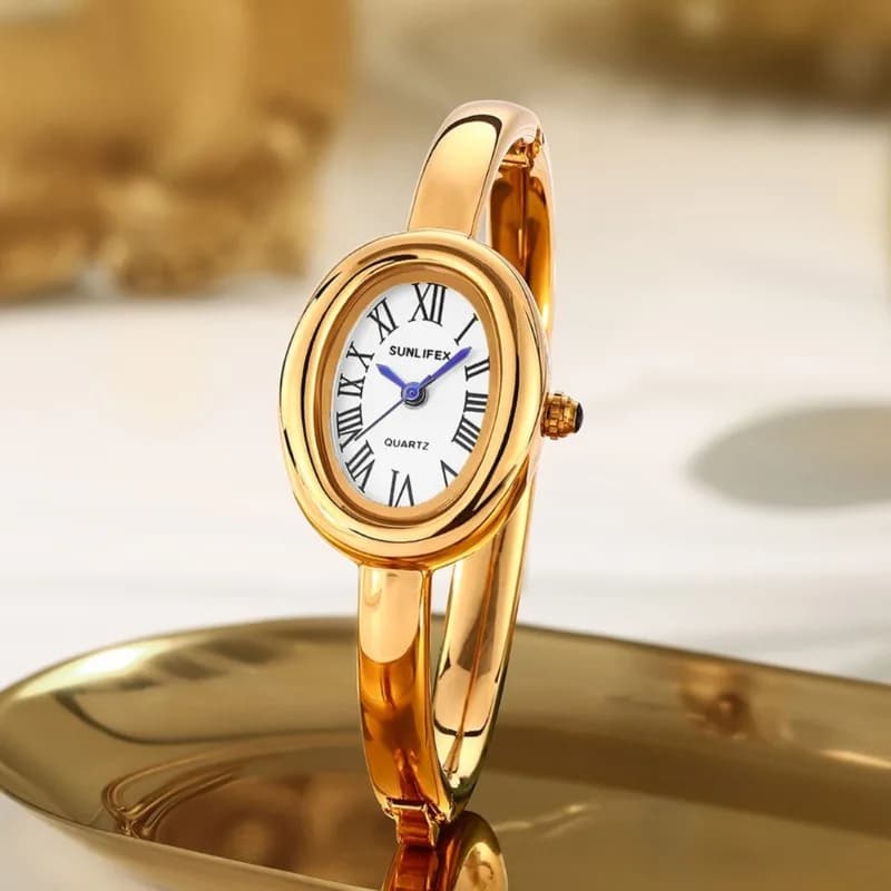 Orologio da polso in oro di marca famosa per donna Orologio al quarzo con quadrante ovale tempestato di diamanti Orologio da polso da donna con regali di lusso Reloj Mujer