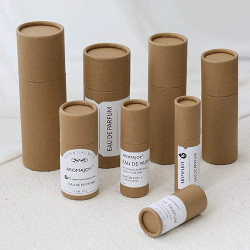 Scatola per imballaggio per bottiglie di olio essenziale con tubo di carta rotonda spessa in pelle bovina, tubo di stoccaggio cosmetico antiurto