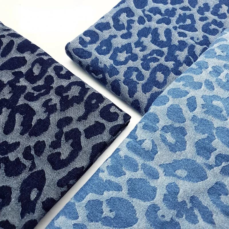 Tessuto denim lavato jacquard tinto in filo spesso leopardo moda cappotto pantaloni borsa federa design laurea panno fai da te cucito all'ingrosso