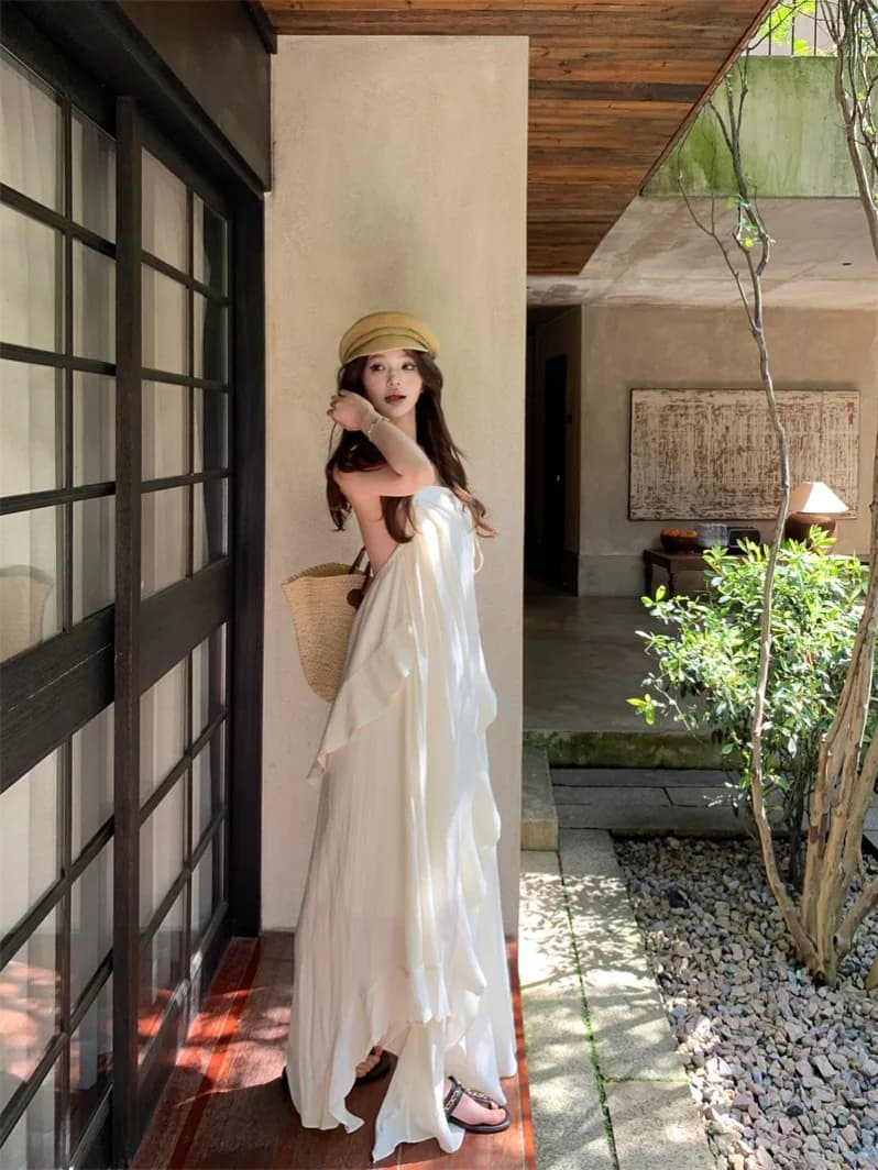 Abito estivo casual da donna con spalline e schiena scoperta, gonna ampia a trapezio con bordo in pizzo, stile casual-elegante, vita naturale, stile coreano a V