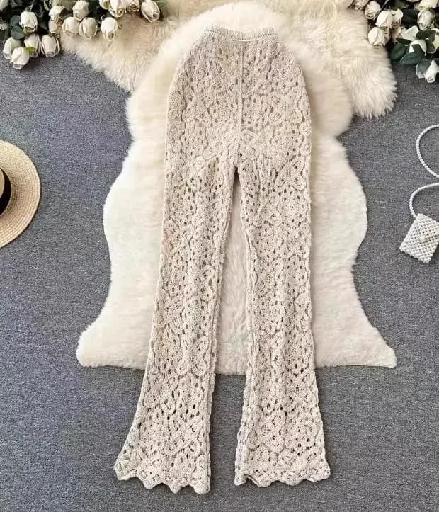 Pantaloni all'uncinetto vuoti con fiori in stile europeo Pantaloni scavati da spiaggia al mare da donna