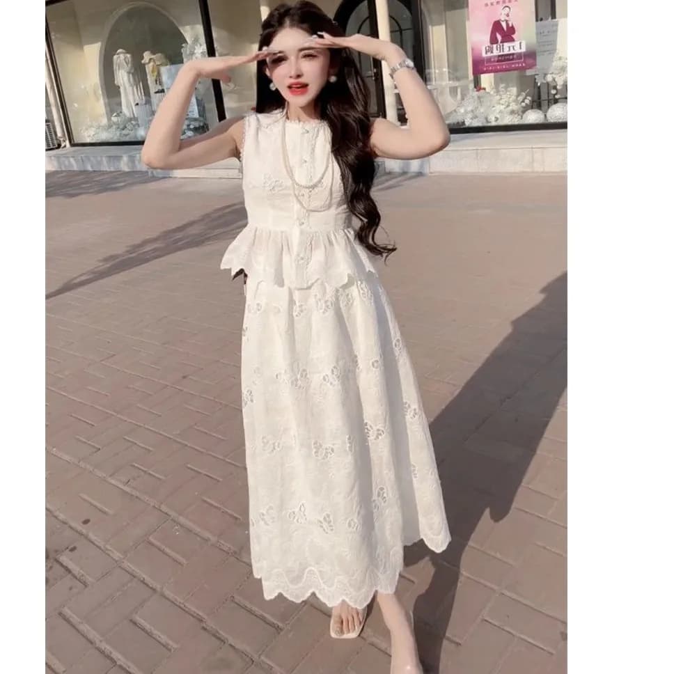 Abito gonna da donna coreana Elegante top senza maniche con bocciolo di farfalla scavato all'uncinetto bianco con gonna a trapezio slim fit a vita alta