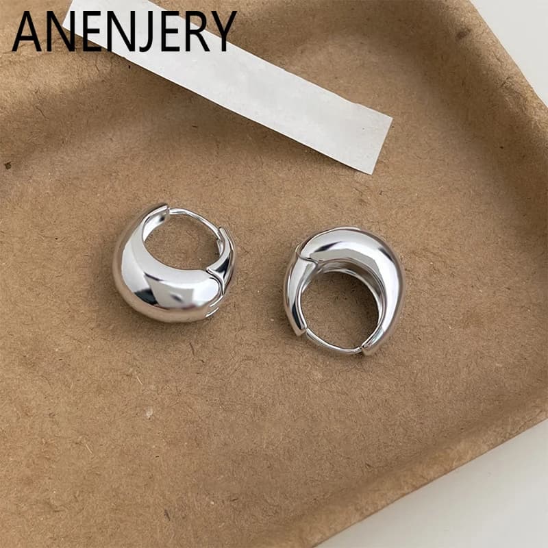 ANENJERY Orecchini a cerchio rotondi con geometria liscia per donna Uomo Fibbie per orecchie Temperamento Regali di gioielli semplici e versatili quotidiani