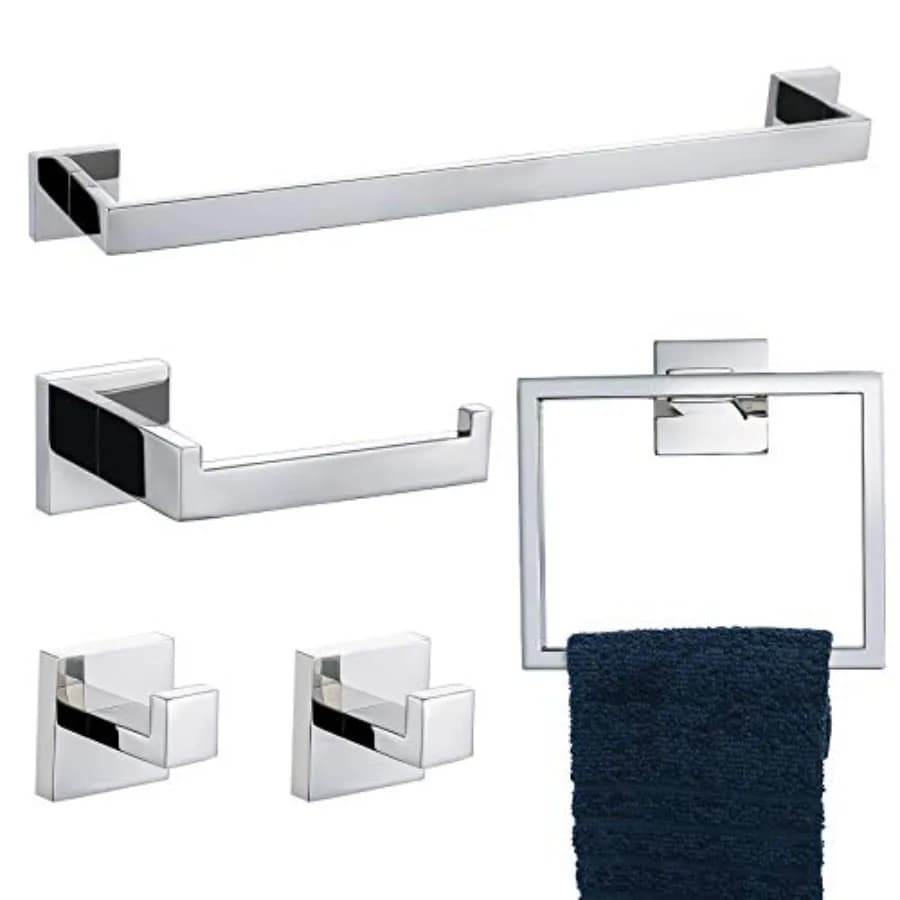 Set di accessori per il bagno in cromo lucido, include portasciugamani, portarotolo e gancio per asciugamani.