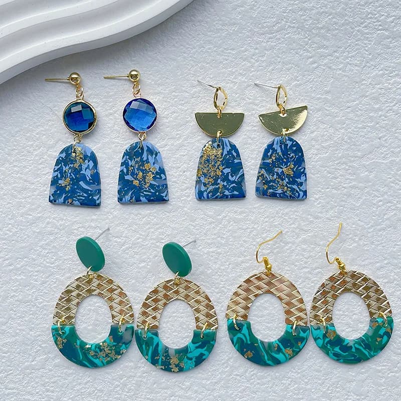 Orecchini popolari in ceramica morbida, design di nicchia da donna, senso avanzato, orecchini a bottone in argilla polimerica fatti a mano