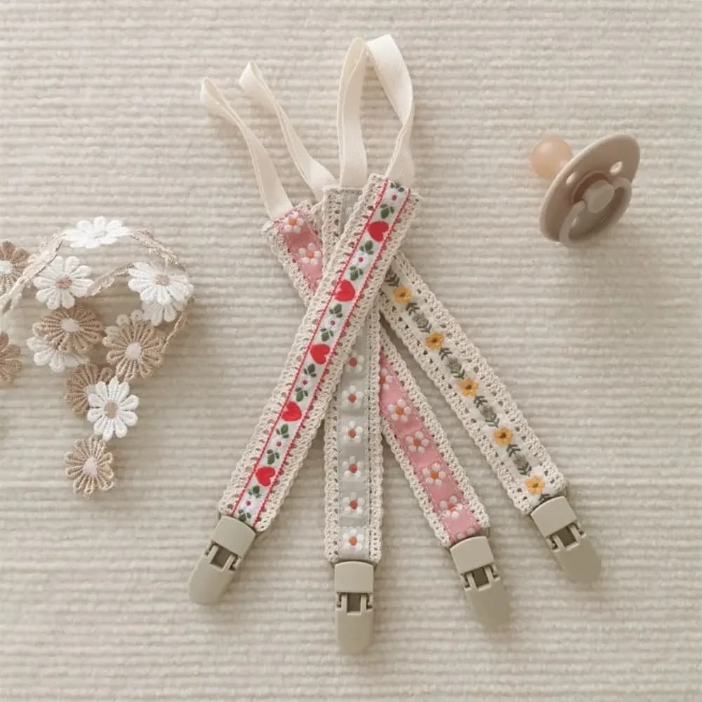 Stile etnico Catena per ciuccio in stoffa per bambini Ricamo floreale Porta succhietto regolabile Clip per ciuccio Cinghie per giocattoli per massaggiagengive