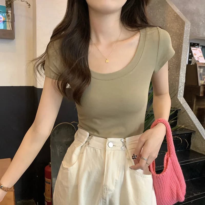 T-shirt estiva coreana alla moda a maniche corte da donna, versatile, con jeans a gamba larga, gonna a mezza lunghezza, gonna a trapezio, top e capi d'abbigliamento.