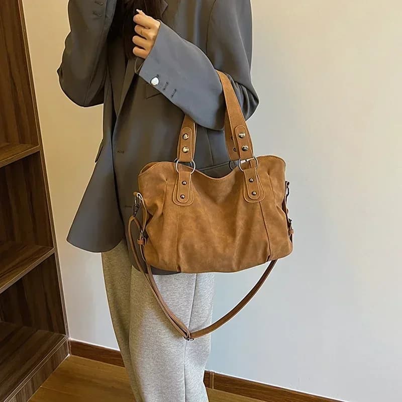 Borsa a tracolla in tinta unita con cerniera in PU con filo per cucire Borsa a tracolla classica semplice alla moda da donna Borsa a secchiello pieghevole per tutti i fiammiferi
