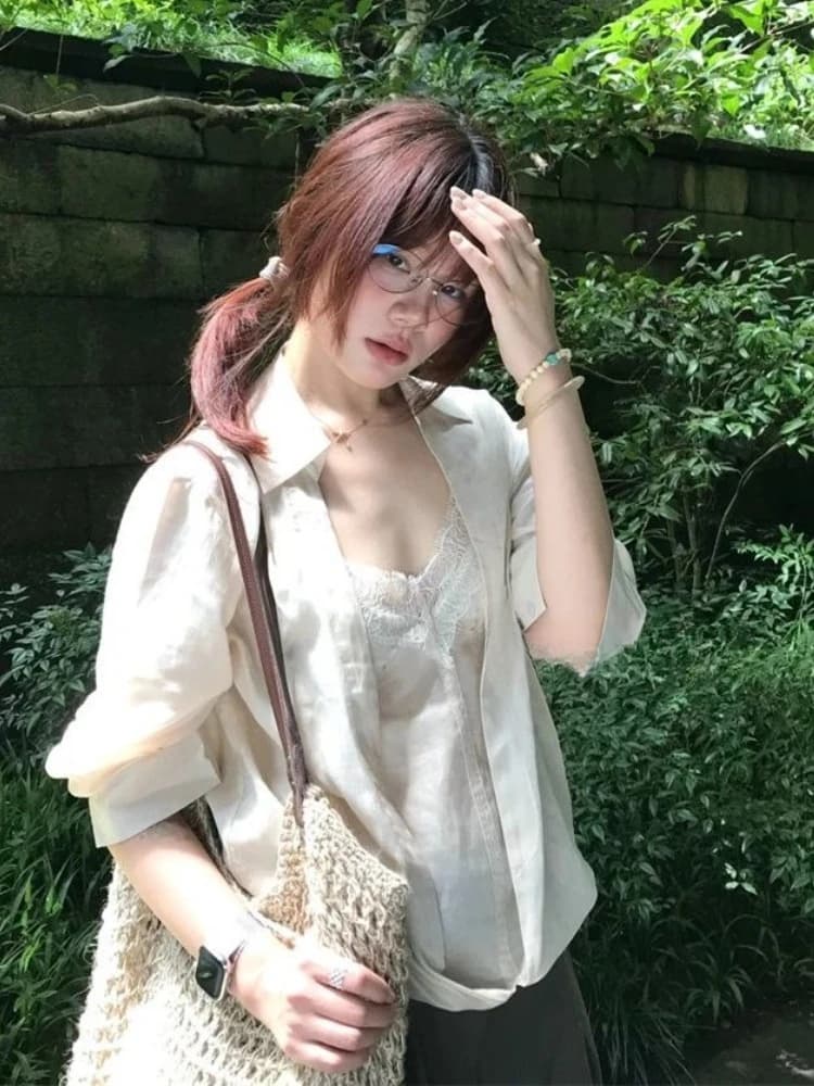 Stile francese elegante cuciture in pizzo falso due top autunno chic solido camicie a maniche lunghe Corea design sexy senso abiti slim 2025
