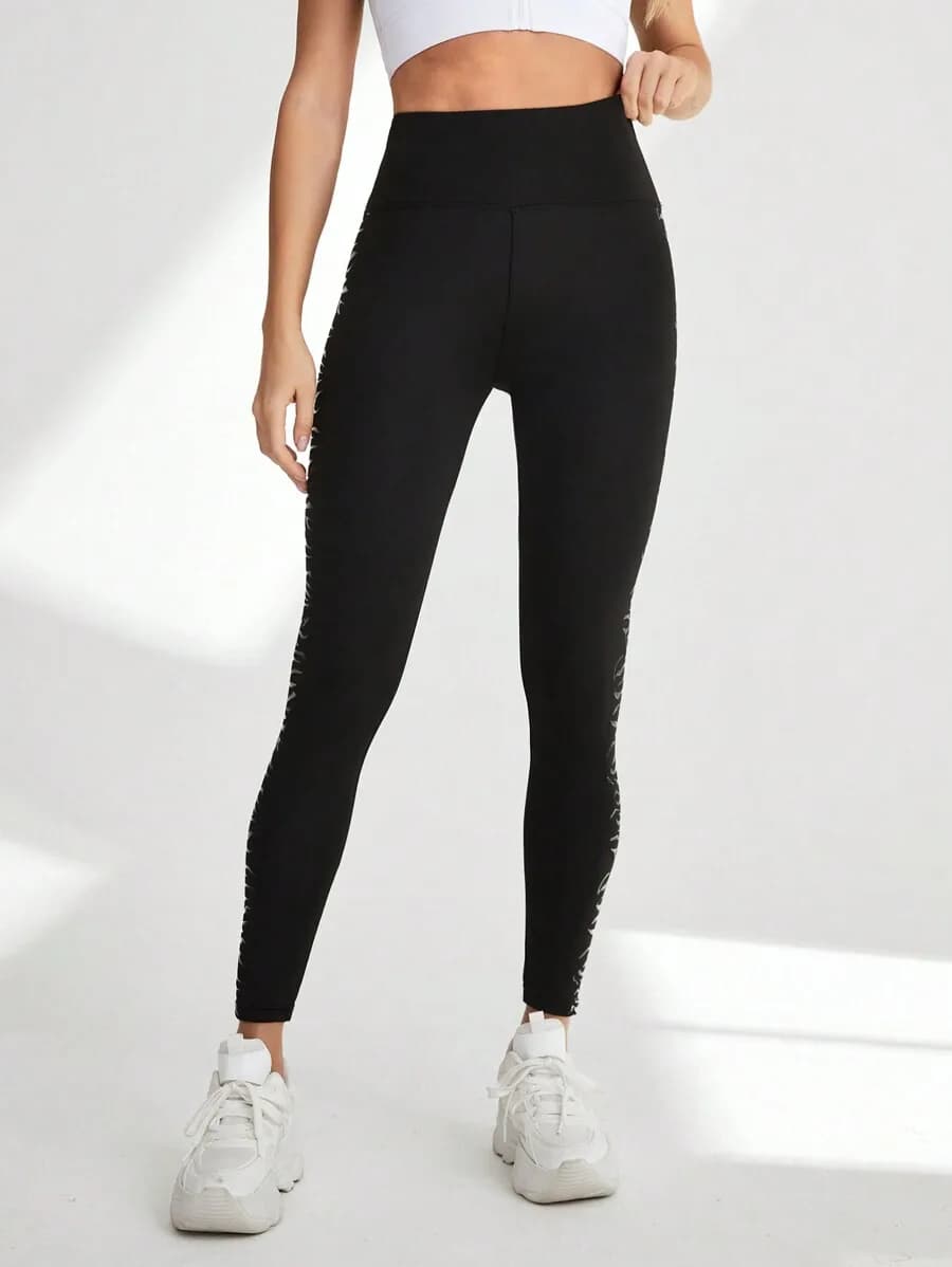 Leggings sportivi da donna a vita alta con ampia fascia stampata, pantaloni da yoga