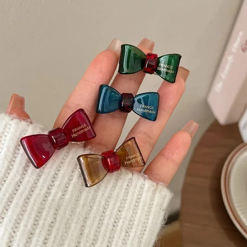 2 nuove ed eleganti fermagli per capelli a forma di fiocco, graziosi per capelli ribelli e frangia, per la fronte e le parti laterali del viso delle donne.