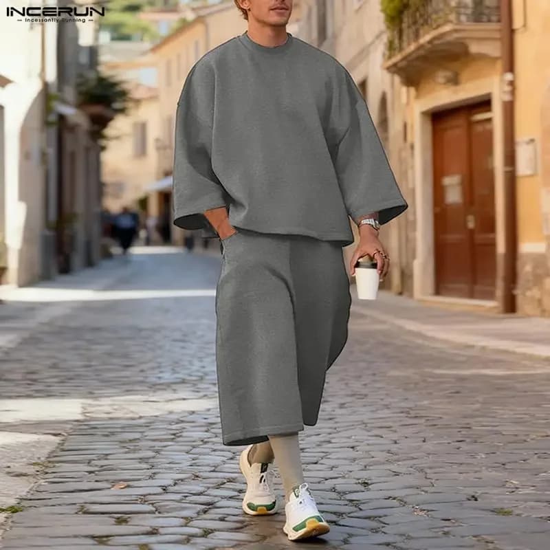 INCERUN men's suits, solid color, with 3/4 sleeve hood sweatshirt and half calf pants, set two pieces, streetwear, wide fit, fashionable men's dresses.