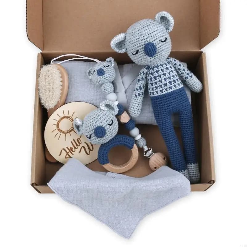 Set giocattoli per bambini da 7 pezzi Coperta per bambini, spazzola per capelli, bavaglini, sonaglio, massaggiagengive e per
