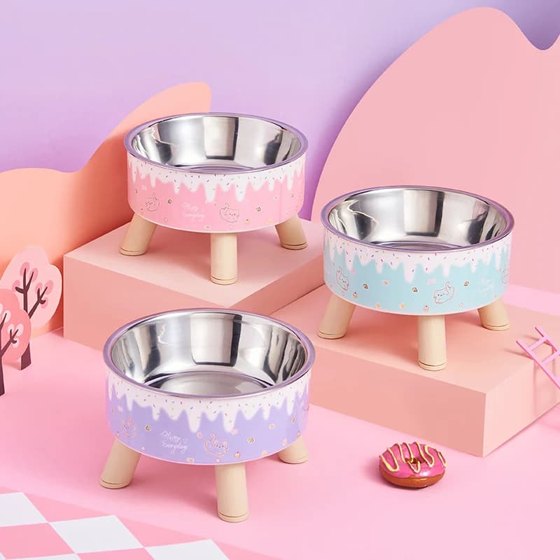 Un ciotola per gelato Ciotola per gatti colorata per l'alimentazione e l'acqua Ciotola per cani dal design dei cartoni animati di moda Ciotola per collo alto per animali domestici con gambe alte