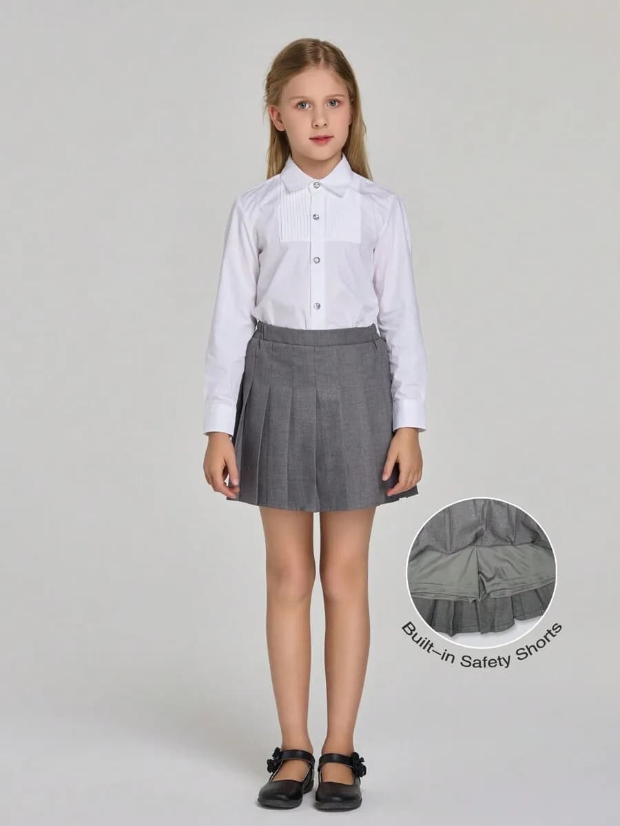 Gonna scolastica plissettata per ragazze con pantaloncini di sicurezza integrati, grigia