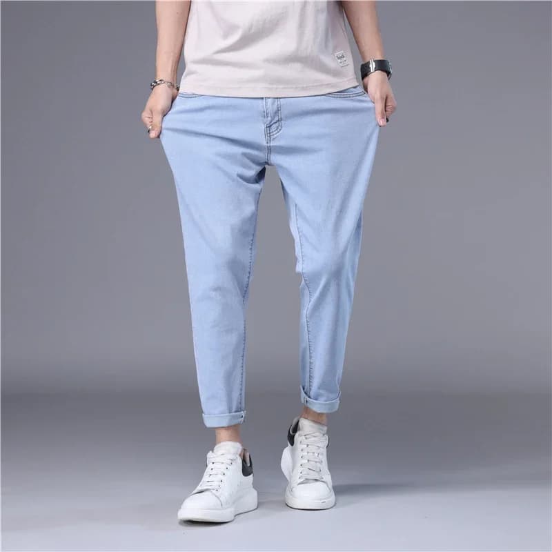 Jeans da uomo sottili estivi stile coreano blu nero tinta unita elasticizzato dritto elegante pantaloni corti in denim slim fit da uomo