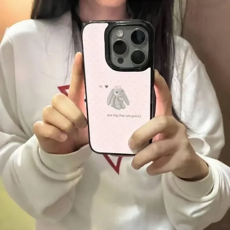Cover per iPhone 17 AIR 16 15 14 13 12 11 Pro XR XS Max 7 8 Plus Y2K con Coniglio Cartone Animato Rosa a Pois e Orecchie Pendenti