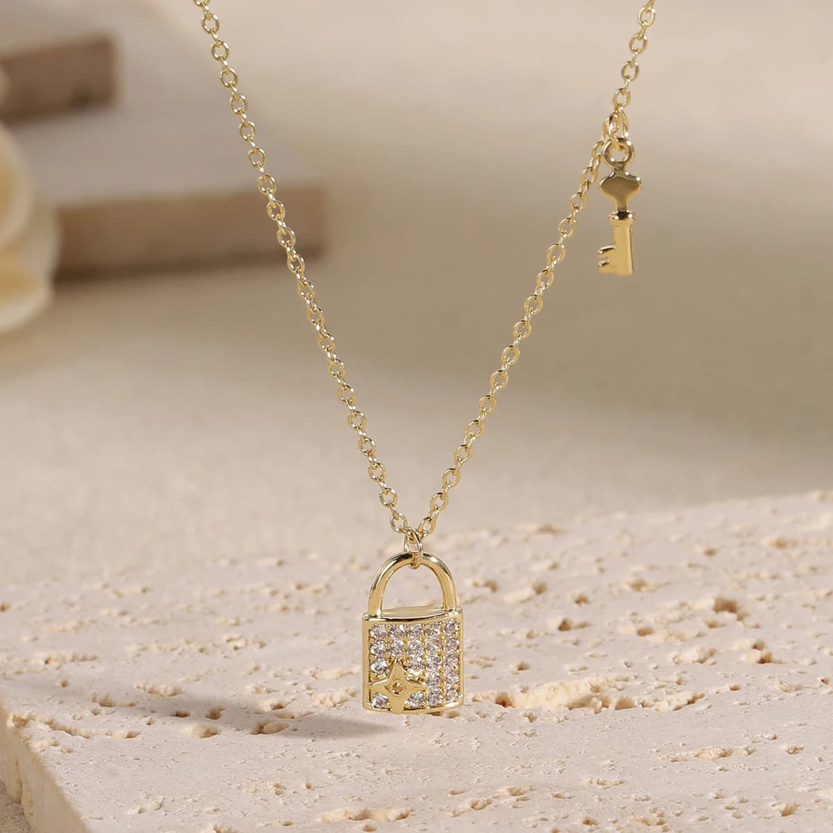 Elegant Gold Plated Starburst Lock and Key Necklace Sparkling CZ Pave Padlock Choker Delicate Asymmetrical Chain Jewelry