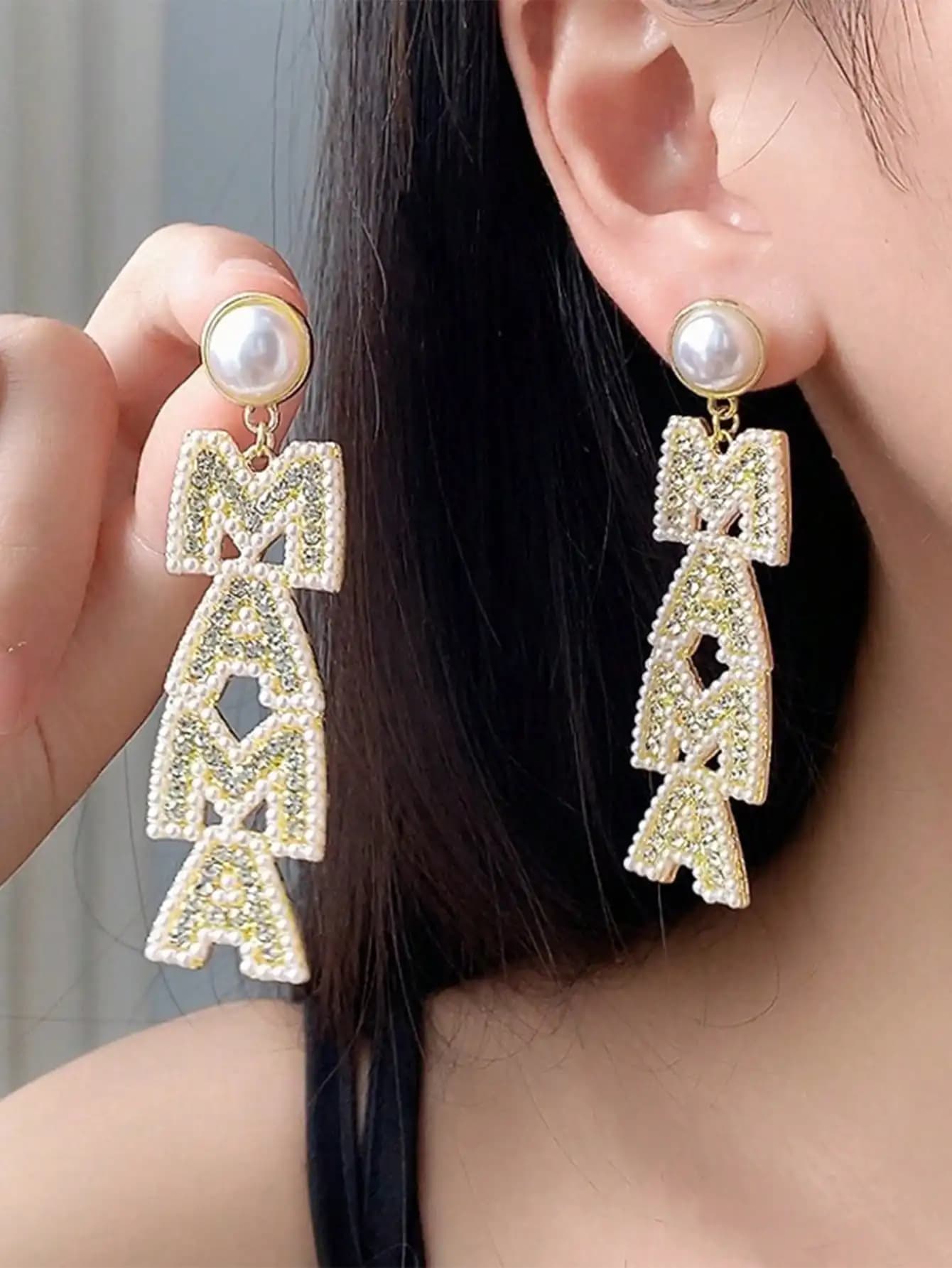 A pair of earrings with faux alphabet shaped pearls MAMA for Mother's Day Gift