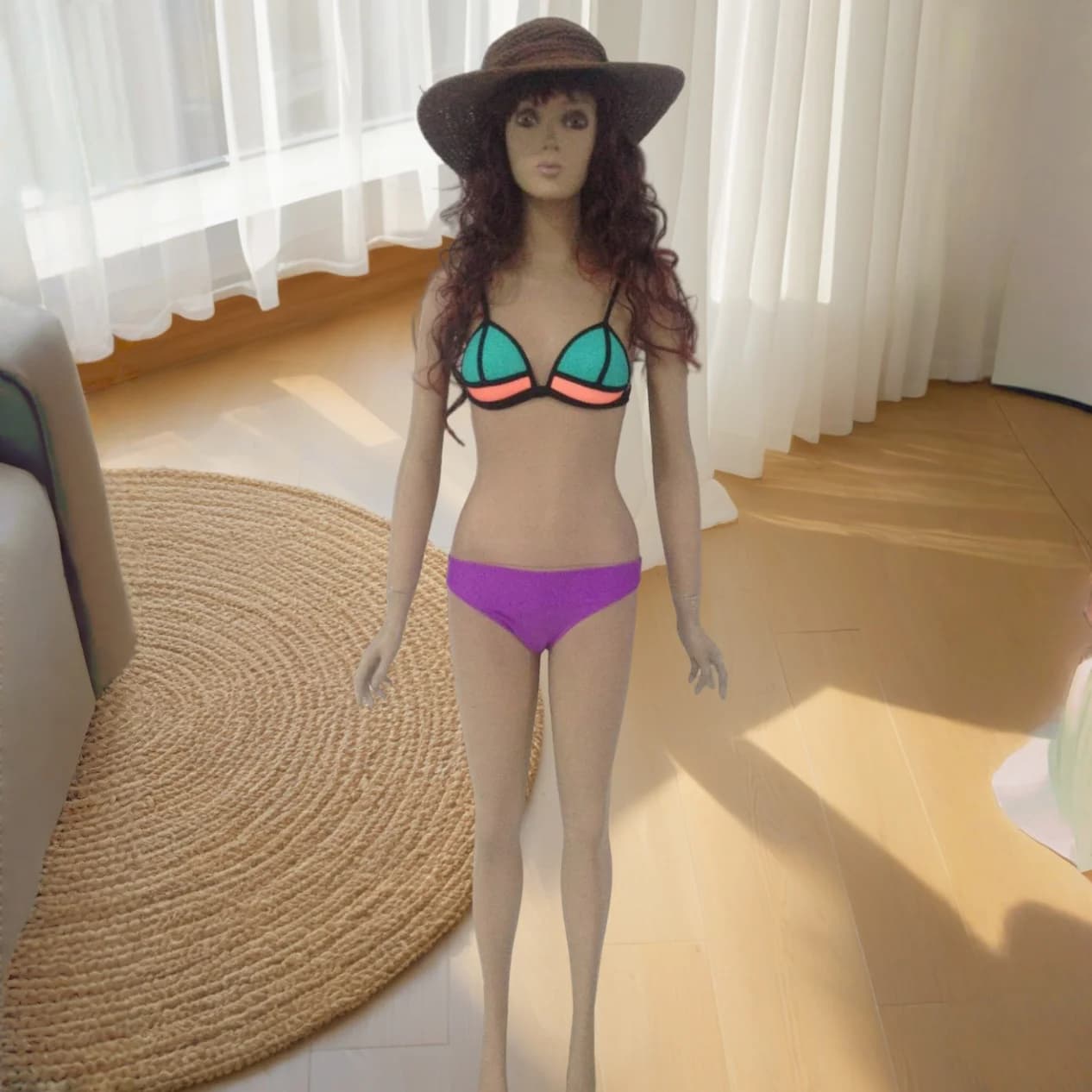 Two-piece bikini swimsuit with triangle top and finishes