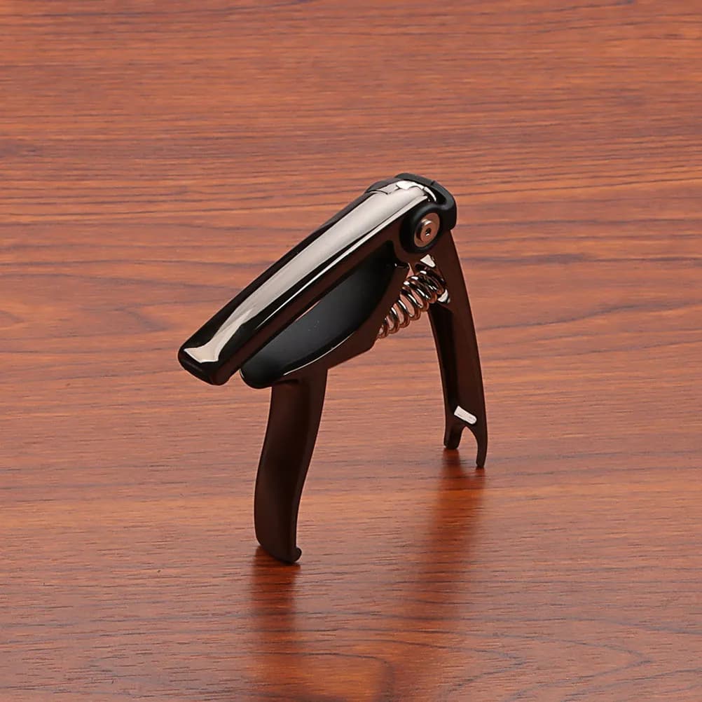 Capotasto per Chitarra Nero con Tensione Regolabile per Chitarra Acustica, Elettrica, Basso, Ukulele - Design a Clip, Impugnatura Ergonomica, Moderno