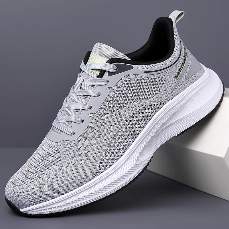 Scarpe da ginnastica casual da uomo Scarpe sportive leggere e traspiranti in maglia da uomo 2025 Nuove scarpe da corsa alla moda in tinta unita Scarpe da ginnastica da uomo