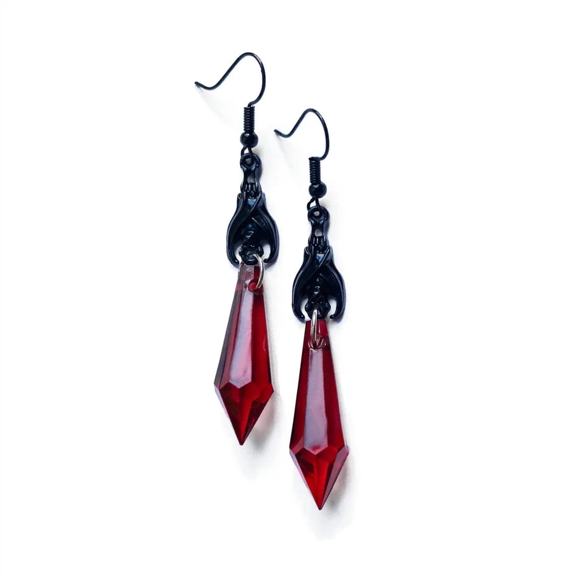 Gothic jewelry with black bats paired with red teardrop earrings