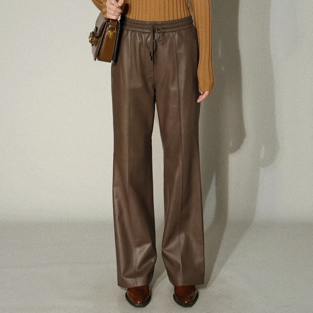 Pantaloni da donna in vera pelle Elastico in vita con coulisse Design Pantaloni lunghi slim in pelle di pecora a gamba larga per l'autunno e l'inverno