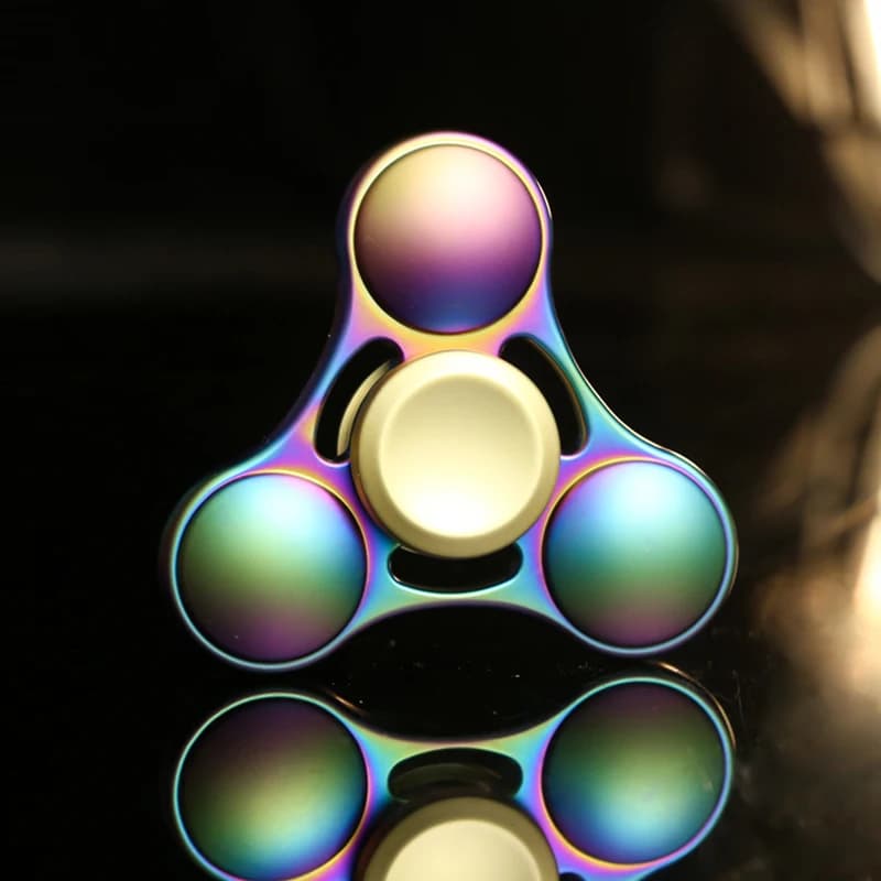 Spinner a mano in metallo colorato arcobaleno Fidget Spinner per rotazione dell'autismo Giocattoli antistress Regali per bambini