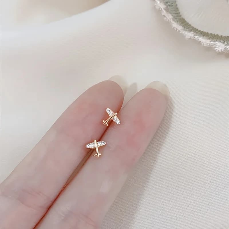 A Pair of Mini Airplane Stud Earrings for Women, Featuring a Unique Design That Is Trendy, Cute, And Perfect for Everyday Commuting Or Dating, Showcasing a Delicate And Compact Style