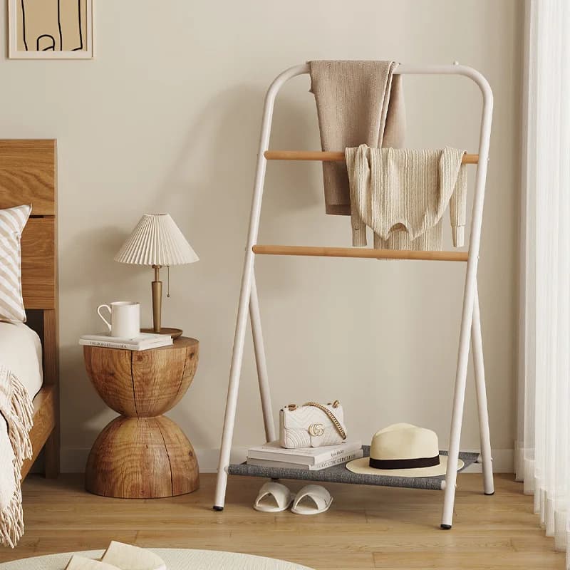 Simple white hanger from ground space saving space for the house, organizer for cheap clothes, furniture for the organization of the interior, furniture for the room