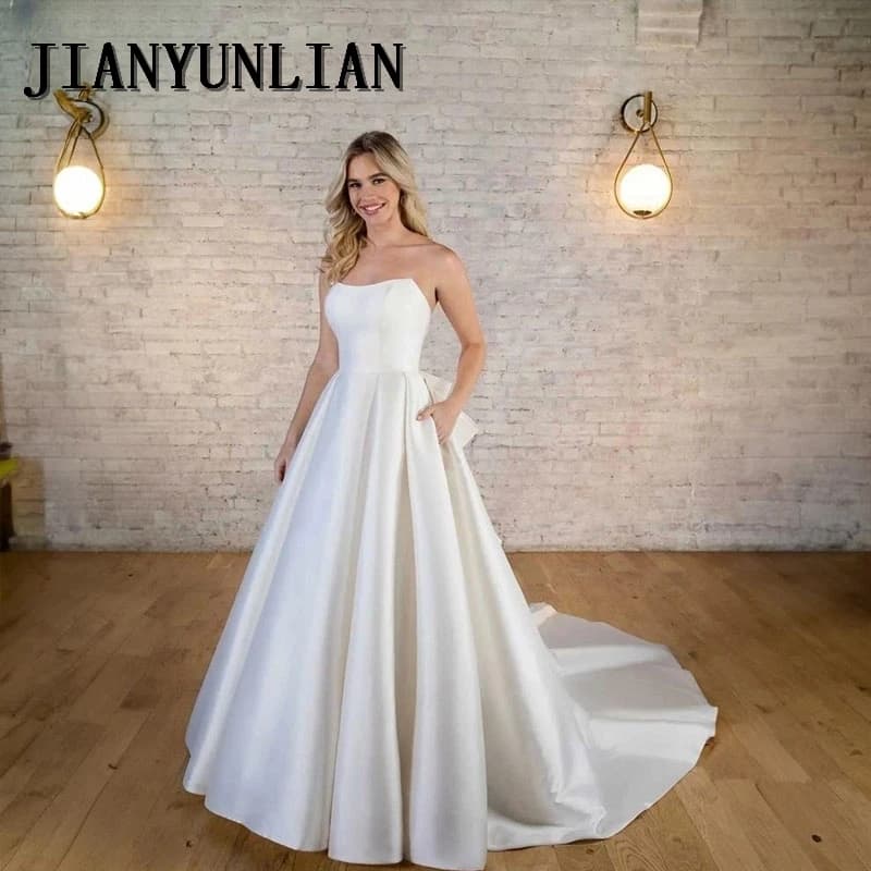 Abiti da sposa in raso con scollo a cuore personalizzati Abiti da sposa sexy senza schienale Senza maniche Elegante principessa Up Stupendi abiti da sposa