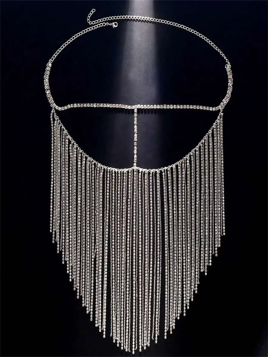 Maschera per mezza faccia con strass e lunghe nappe per costume da festa per donna