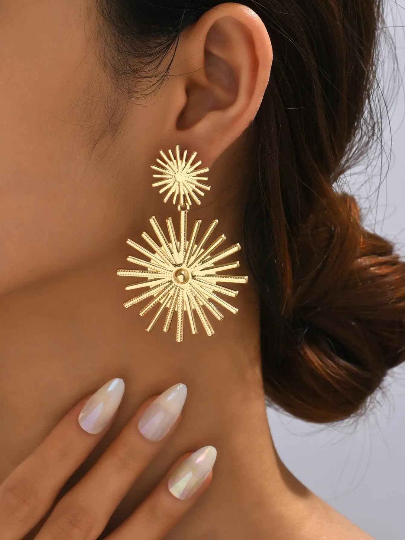 Orecchini pendenti a doppio sole dorato per donna
