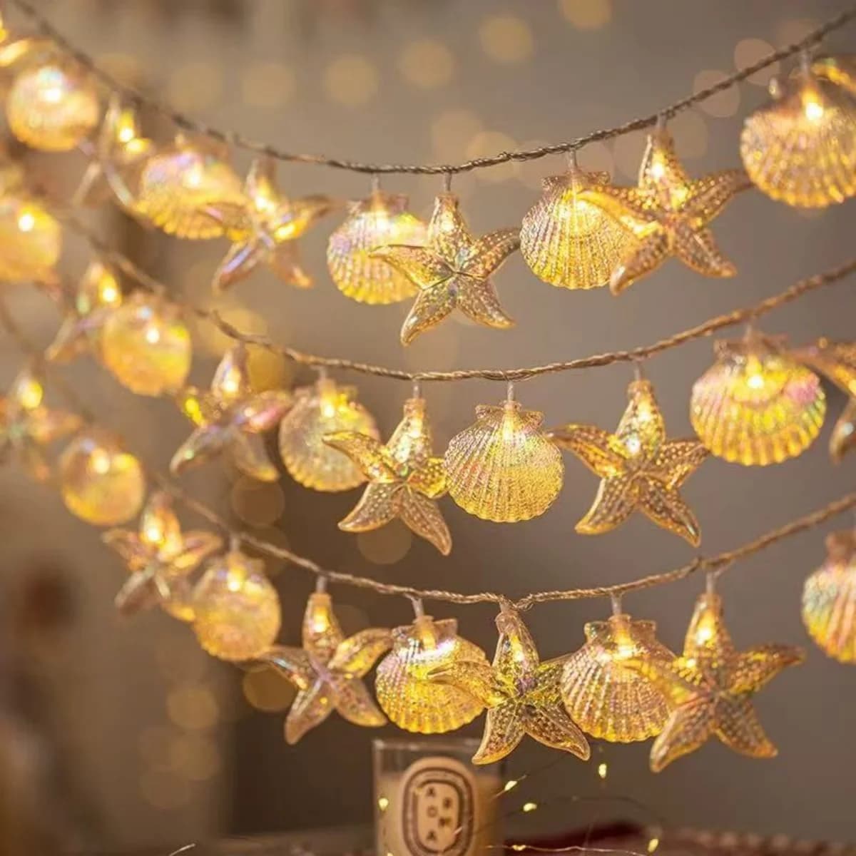 Stringa luminosa a LED conchiglia di stelle marine con conchiglia colorata da sogno ed elegante, piena di elementi oceanici che impreziosiscono l'atmosfera domestica
