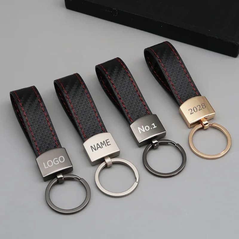 Portachiavi con logo personalizzato Portachiavi per auto con incisione laser in fibra di carbonio vuota Ciondolo in metallo Portachiavi personalizzati Corda