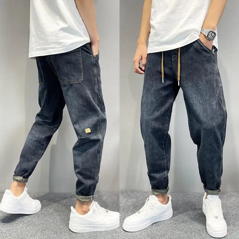 Pantaloni a carota affusolati larghi lavati Vintage in Denim Casual da uomo autunno Streetwear Jeans ricamati pantaloni larghi da jogging Harem