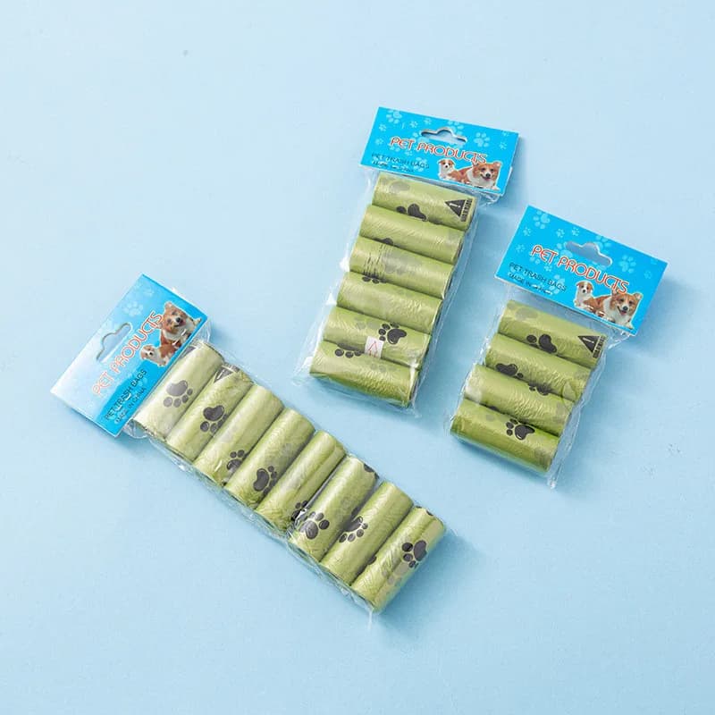 Sacchetti di cacca per animali domestici sacchetti di rifiuti per cani usa e getta sacchetti di cacca sfusi con Clip per guinzaglio e sacchetti per Dispenser di sacchetti di ossa con stampe di zampa