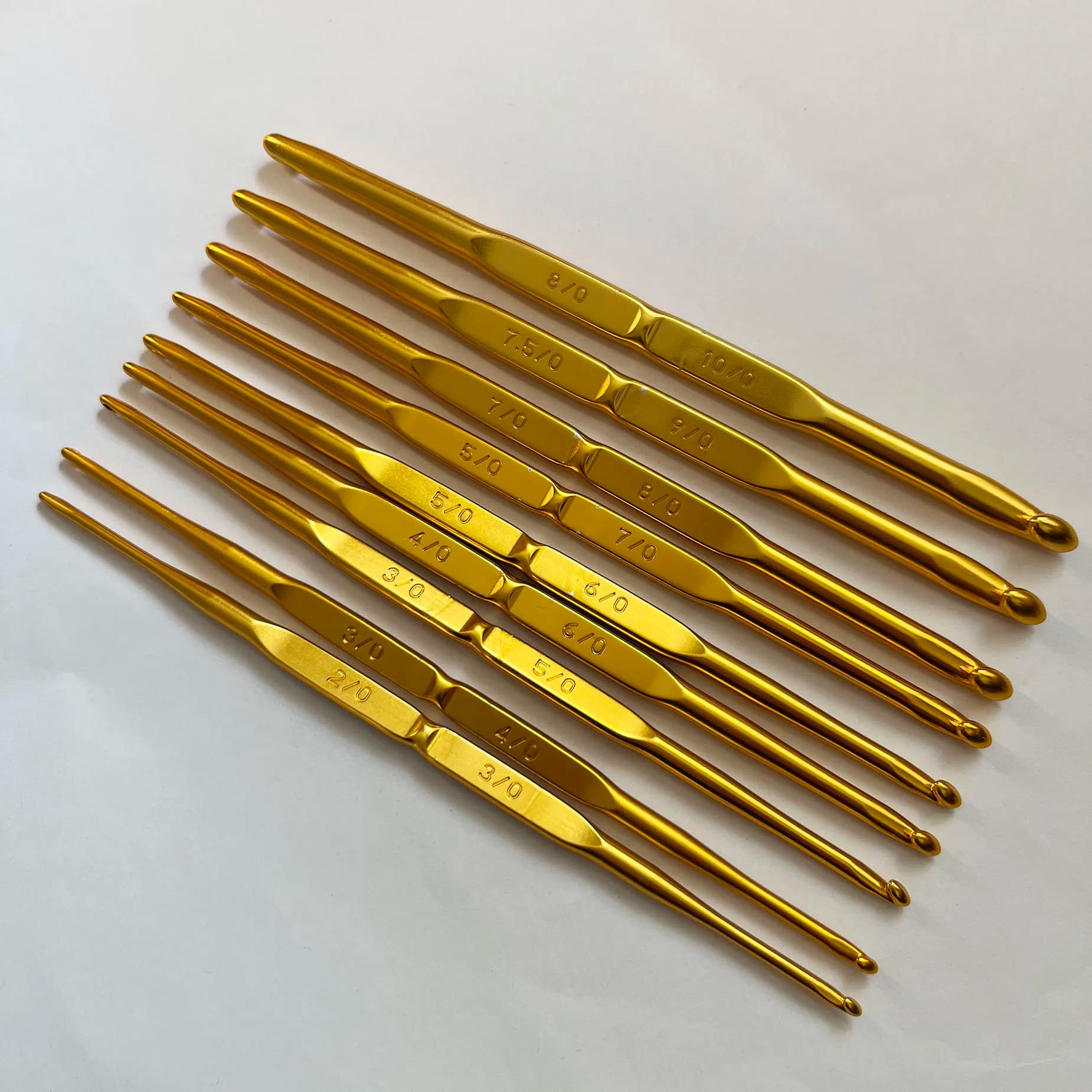 TULIP Uncinetto a doppia testa oro/argentato 1 ordine=1 pz