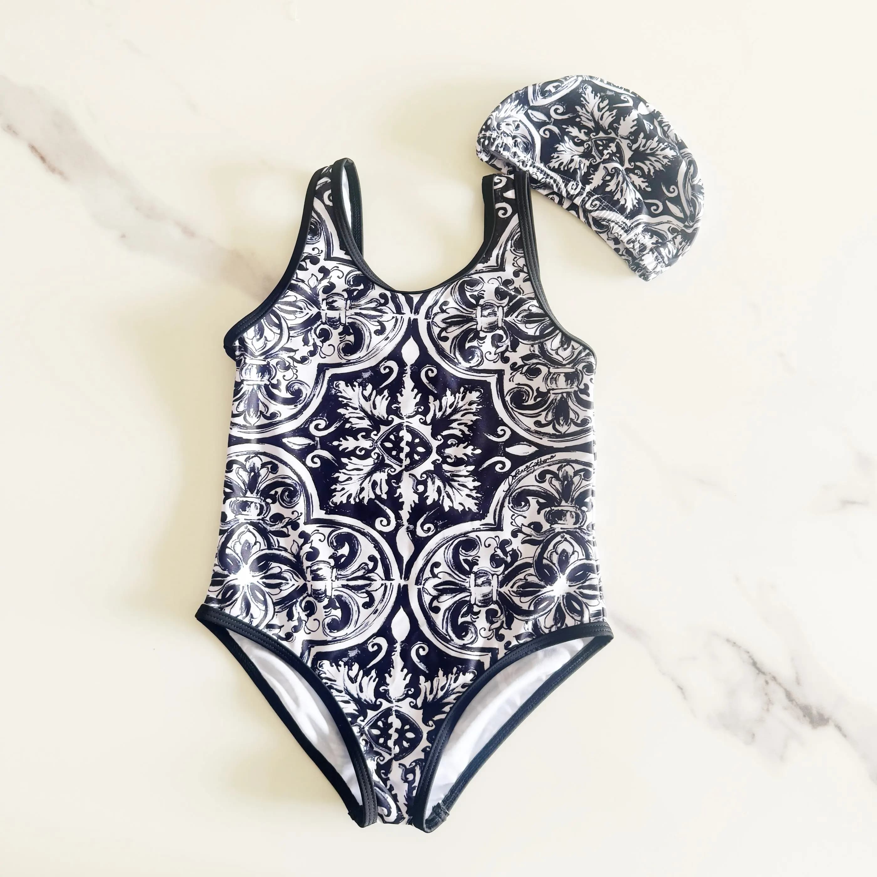 Full swimsuit for baby girl 2026, last model, with black flower, for summer, from 1 to 12 years