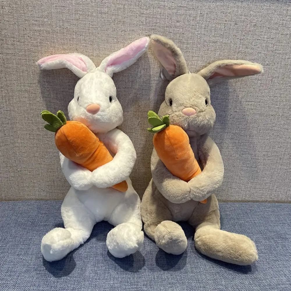 Giorno di Pasqua Simpatico coniglietto seduto bianco grigio che abbraccia la carota Regali per bambole di coniglio simulato per bambini Decorazioni per feste di Pasqua primaverili