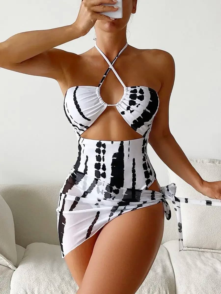Costume da bagno intero tie-dye con cut-out e laccetti al collo, con gonna da spiaggia